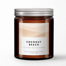 Load image into Gallery viewer, Coconut Beach candle by Terra Mater Studio with a white label on a light gray background