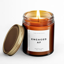 Load image into Gallery viewer, engaged af engagement candle with lid on side for couple