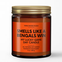 Load image into Gallery viewer, smells like a Cincinnati bengals win scented candle with lid on