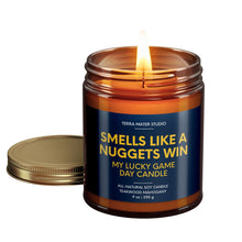 Load image into Gallery viewer, smells like a denver nuggets win scented candle with lid on side