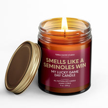 Load image into Gallery viewer, smells like a florida state seminoles win scented candle with lid on side