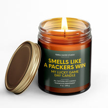 Load image into Gallery viewer, smells like a green bay packers win scented candle with lid on side