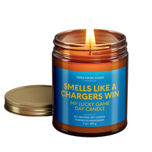 Load image into Gallery viewer, smells like a los angeles chargers win scented candle with lid on side