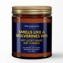 Load image into Gallery viewer, smells like a michigan wolverines win scented candle with lid on