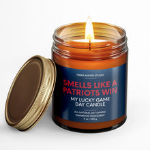 Load image into Gallery viewer, smells like a new england patriots win scented candle wth lid on side