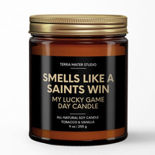 Load image into Gallery viewer, smells like a new orleans saints win scented candle with lid on