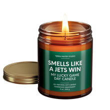 Load image into Gallery viewer, smells like a new york jets win scented candle with lid on side