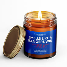 Load image into Gallery viewer, smells like a new york rangers win scented candle with lid on side