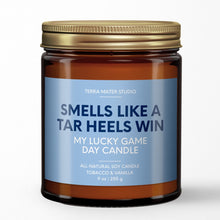 Load image into Gallery viewer, smells like a north carolina tar heels win scented candle with lid on