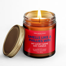 Load image into Gallery viewer, smells like a phillies win scented candle with lid on side