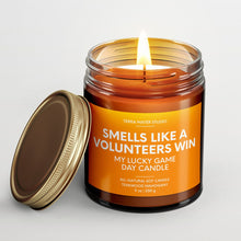 Load image into Gallery viewer, smells like a tennessee volunteers win scented candle with lid on side