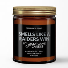 Load image into Gallery viewer, smells like a vegas raiders win scented candle with lid on