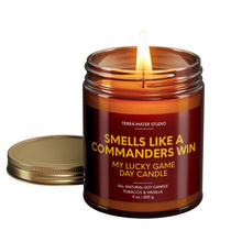 Load image into Gallery viewer, smells like a washington commanders win scented candle with lid on side