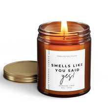 Load image into Gallery viewer, smells like you said yes engagement scented candle with lid on side
