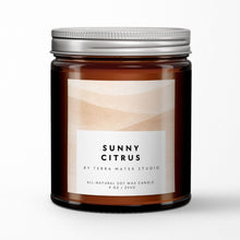 Load image into Gallery viewer, Sunny Citrus soy wax candle by Terra Mater Studio with a metallic lid on a white background