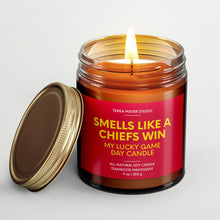 Load image into Gallery viewer, smells like a kansas chiefs win scented candle with lid on side
