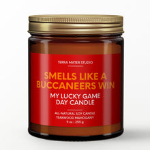 Load image into Gallery viewer, smells like a tampa bay buccaneers win scented candle with lid on
