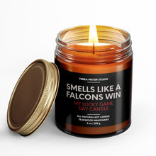 Load image into Gallery viewer, smells like an atlanta falcons win scented candle with lid on side
